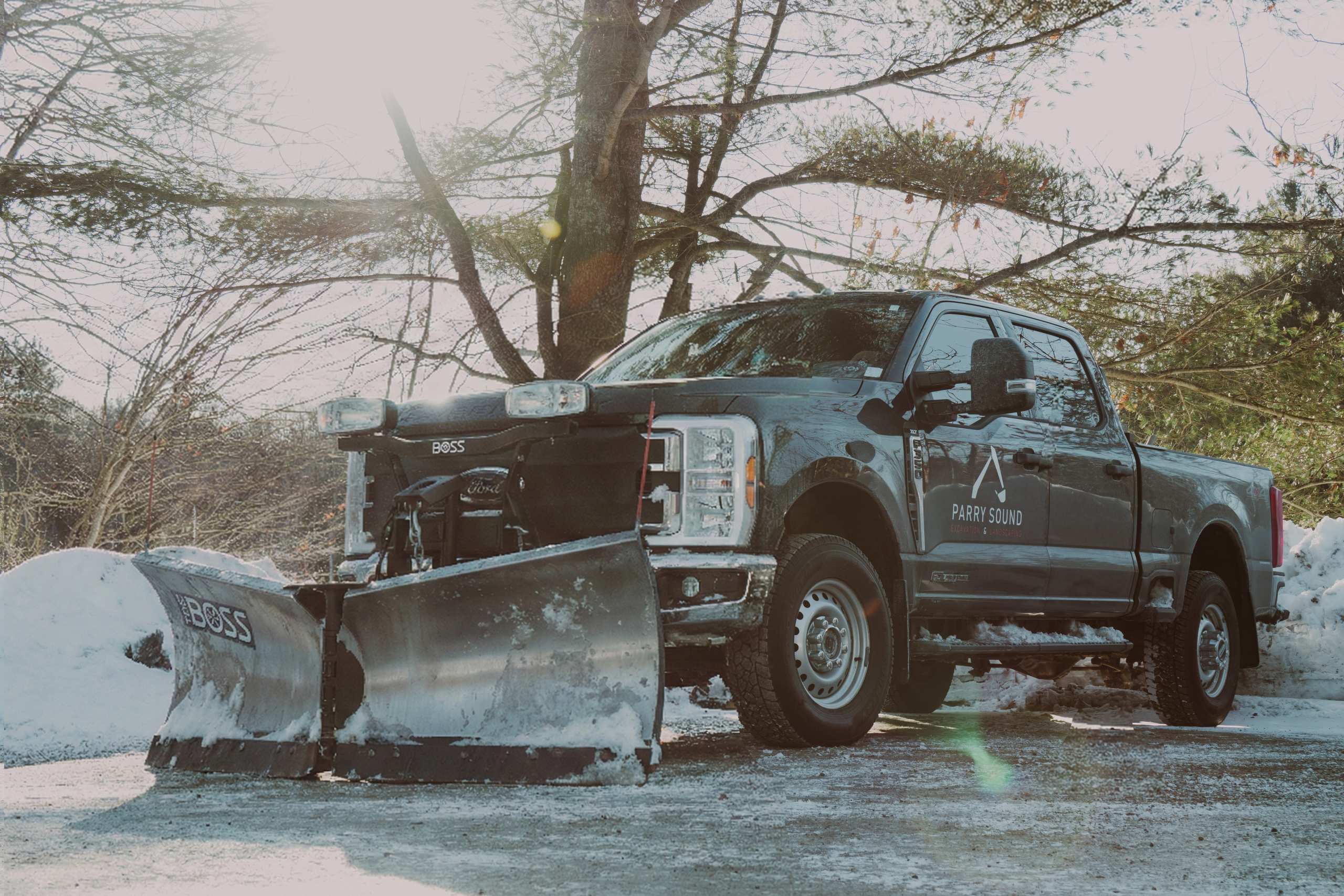 Parry Sound Excavation pickup truck with snow plow